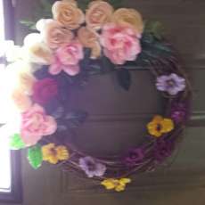 Beautiful grapevine wreath with roses and panseys