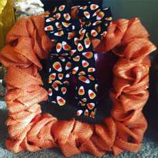 Orange Wreath with Candy Corn Bow