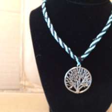 Silver Tree of Life on 22" of Braided Turquoise and Black Braid