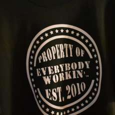 Product of Everybodyworkin short sleeve  tshirt