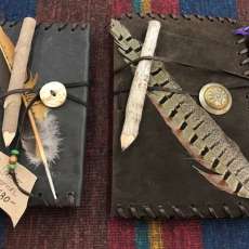 Leather covered journals with twig pencils