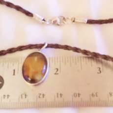 Radiant Tiger's Eye Pendant in Sterling Silver Bezel on Brown Braided Leather Necklace with Sterling