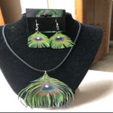 Handcrafted leather peacock necklace and earrings to match