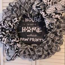 A House is not a Home Without Paw Prints