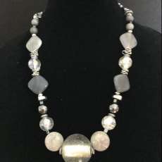Gray and metal necklace