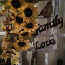 Window frame sunflower wreath with ceramic bird and family love sign