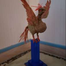 3D art sculpture Firebird on wooden plinth
