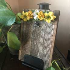 Yellow spring floral on reclaim barn wood