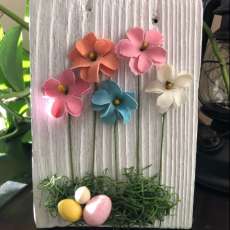 multi-color floral Easter on reclaim barn wood