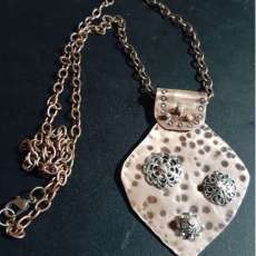 Copper and silver pendant with copper chain