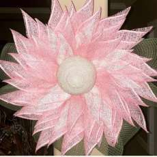 Pink poinsettia flower wreath. Use on door or wall decor