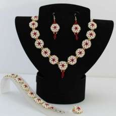 White Necklace Set accented with red beads and gold crystals by Swarovski
