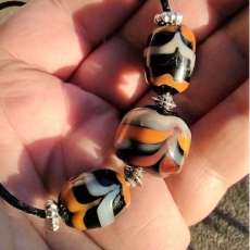 Handmade Lampwork Glass Bead Necklace on Black Leather Cord with Claw Closure