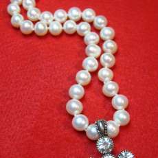 white shiny AAA Freshwater pearl 8mm with a removable cross pendant 17" lenght