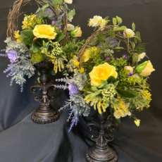 Grapevine floral arrangement on candlestick