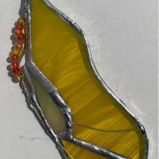 'Goldfinch' Feather stained glass w/ gold/ orange glass beading