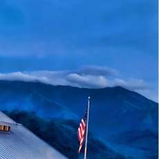 Ole Glory with Background of Smoky Mountains from the Skybridge in Gatlinburg, Tn