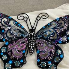Butterfly on metal