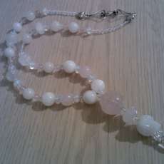 Carved Rose Quartz Skull Necklace with Moonstone and Pink Aventurine