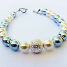 Swarovski White and Light Blue Pearls, Crystal Rondelle Spacers, and Stardust Round Bracelet