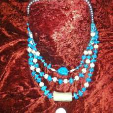 Turquoise, bone, and silver necklace