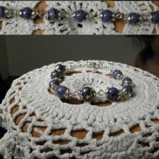 Purple swirl beads and fancy wire work bracelet