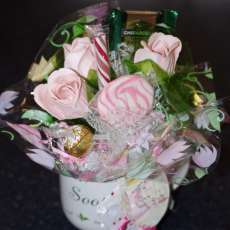 Tea Mug with flowers, tea, and candy