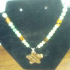 Very unusual tiger eye necklace with agate and burnt bone