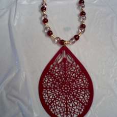 Red and Gold glass bead necklace with red metal pendant