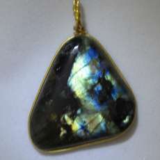 Labradorite with gold circumfrential wire wrap 43 ct