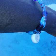 YJJ-O5 (with center piece: a roundish white shell-a mysterious ocean creature inside)?